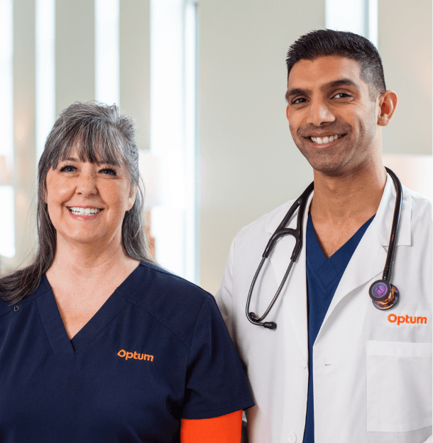 Two smiling Optum WA healthcare professionals