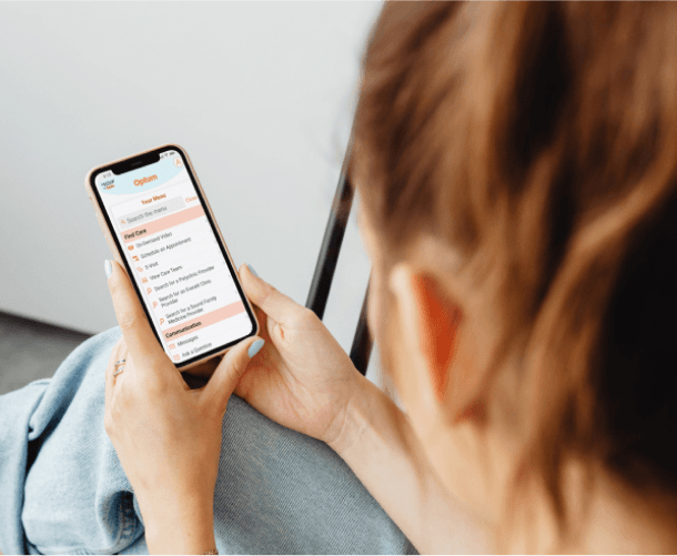 Woman using the Optum WA MyChart app on her smartphone for healthcare management